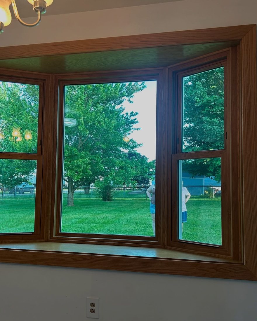 Lewisburg dining room after, with the new bay window and oak interior trim